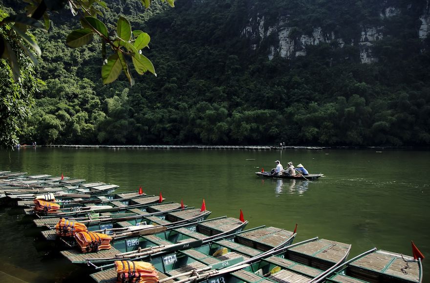 Tam Coc is often called ” Halong Bay on land ‘ for the system of limestone caves and historic sites from the Tran in 13th and 14th century. (Photo by Nese Arı )